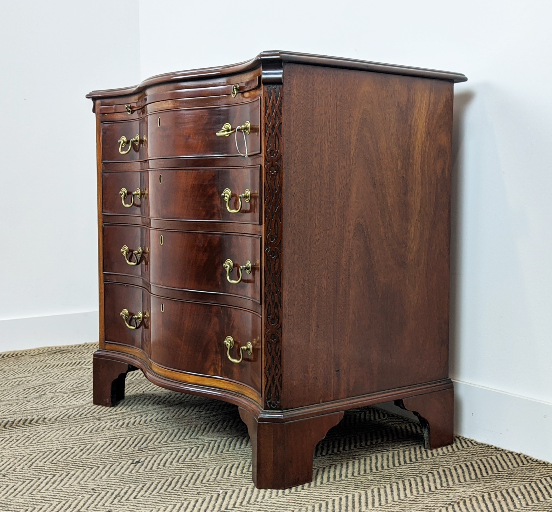 SERPENTINE CHEST, George III style mahogany with brushing slide above four drawers, 78cm H x 81cm - Image 4 of 10