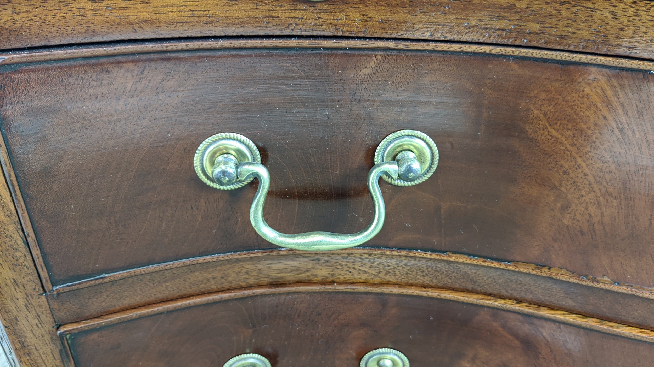 SERPENTINE CHEST, George III style mahogany with brushing slide above four drawers, 78cm H x 81cm - Image 6 of 10