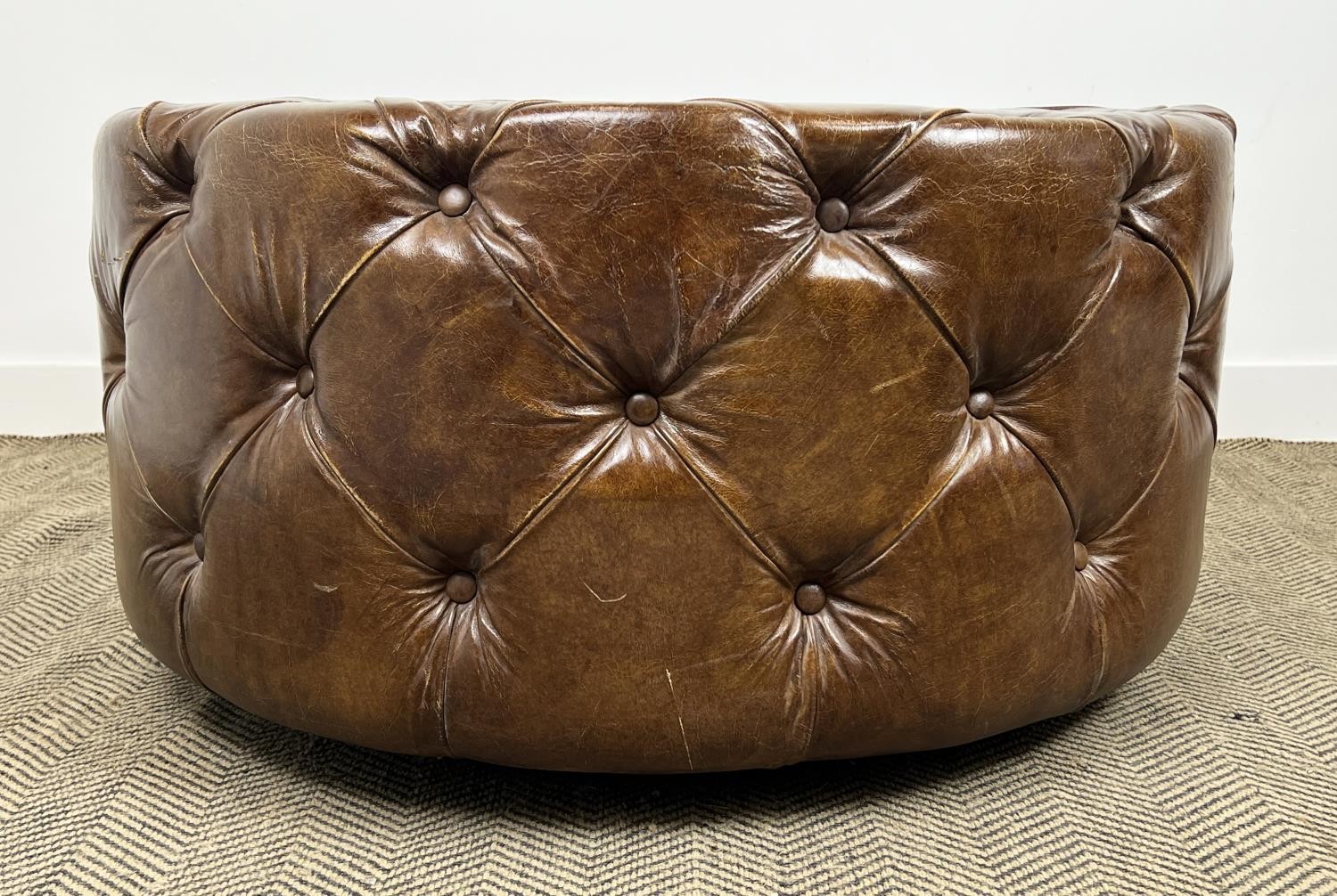 FOOTSTOOL, revolving buttoned hand dyed tanned leather, 55cm H x 98cm diam. - Image 4 of 5