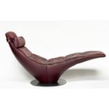 NATUZZI CHAISE, stitched leather revolving on circular steel support, 173cm W.