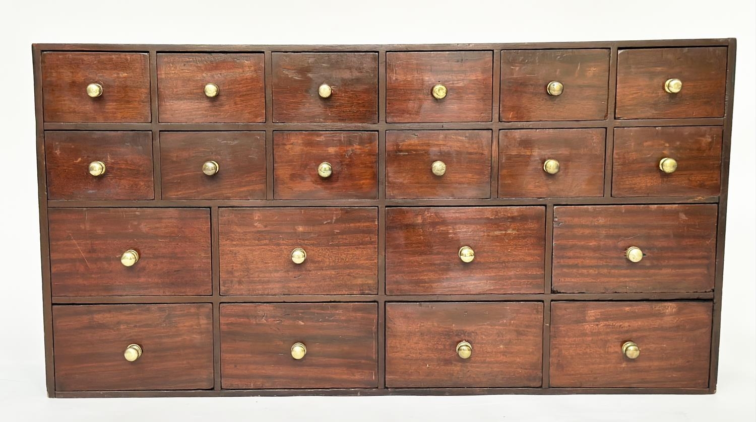 BANK OF DRAWERS, 19th century mahogany of twenty drawers, 123cm W x 23cm D x 64cm H.
