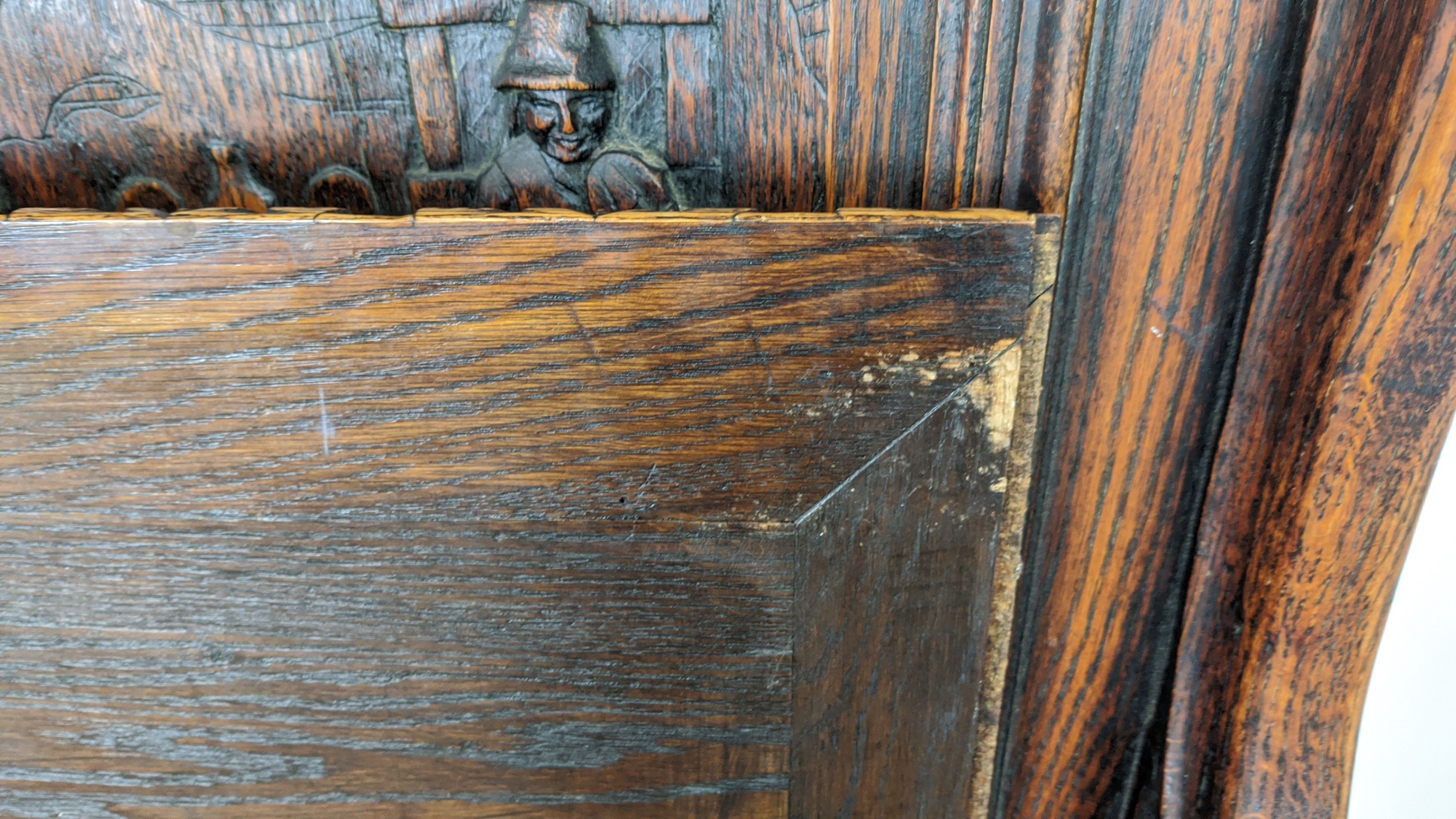 SETTLE, early 20th century Jacobean style oak with lion carved arms and hinged seat, 122cm H x - Image 9 of 12