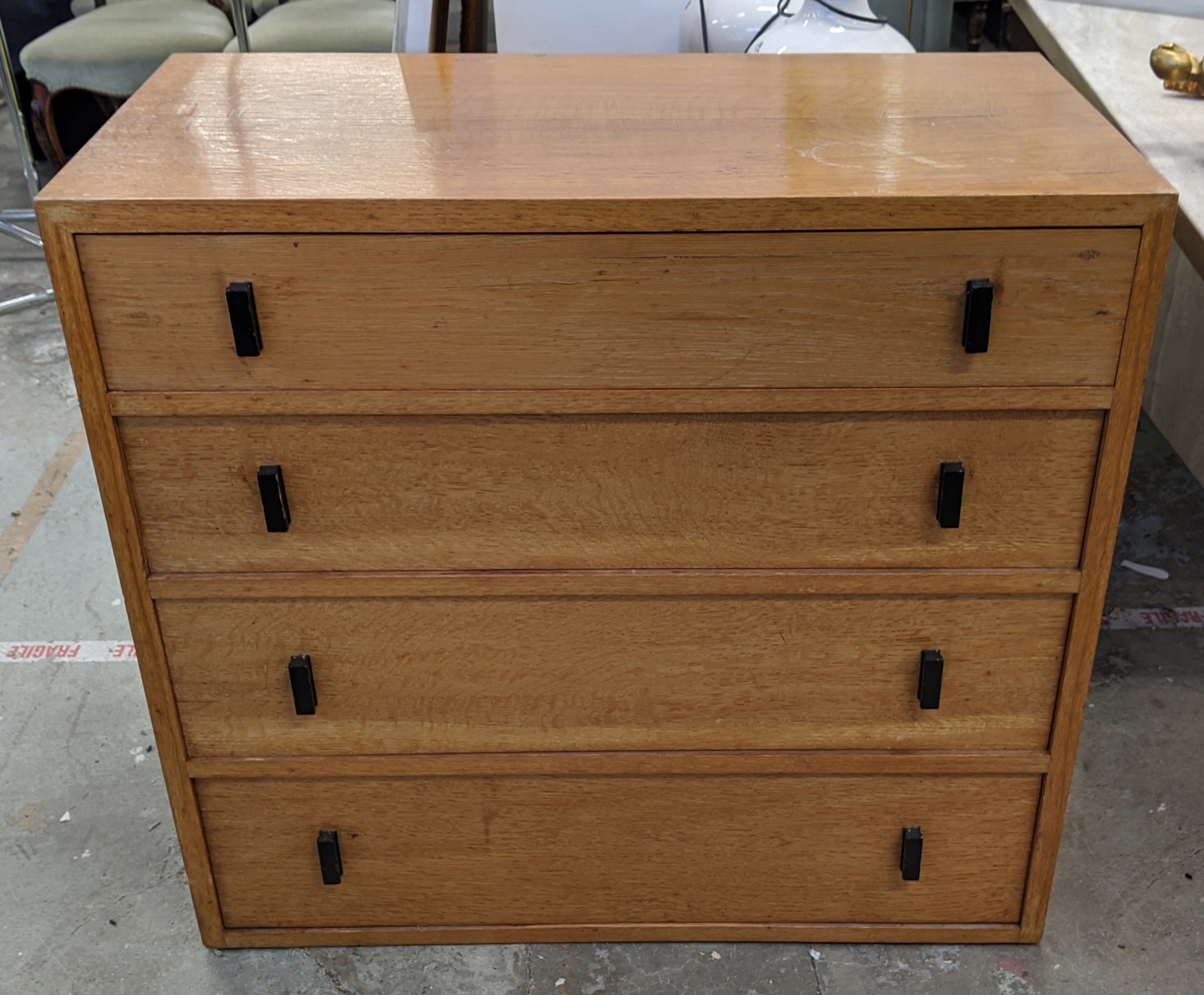 G PLAN STYLE CHEST, mid 20th century oak, with ebonised handles, 91cm W x 43cm D x 83cm H.