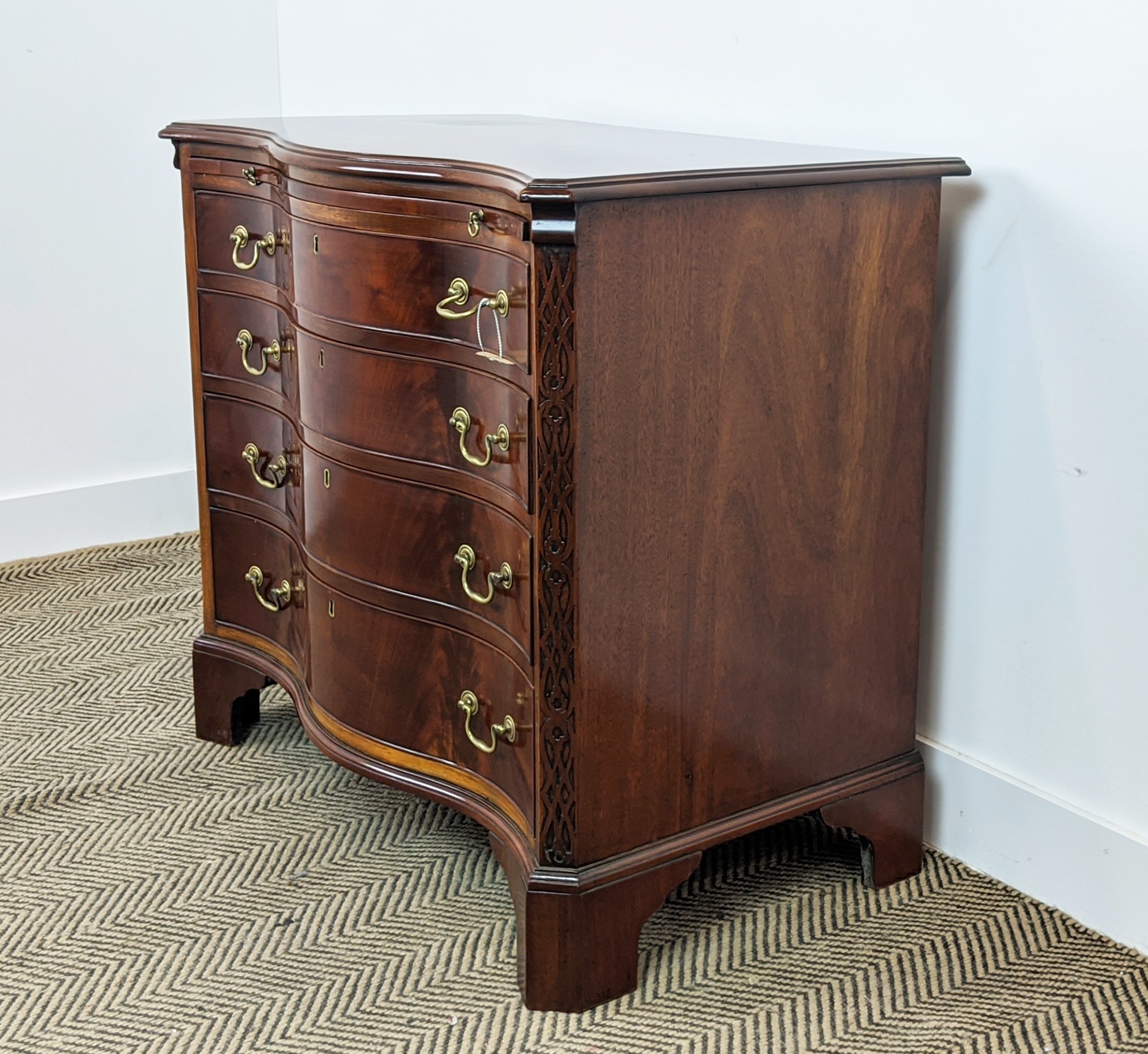 SERPENTINE CHEST, George III style mahogany with brushing slide above four drawers, 78cm H x 81cm - Image 3 of 10
