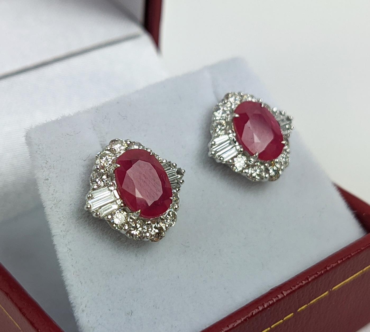 A PAIR OF 18CT WHITE GOLD RUBY AND DIAMOND STUD EARRINGS, the central mixed cut stones of - Image 3 of 7