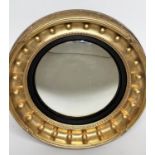 CONVEX WALL MIRROR, Regency giltwood with convex mirror plate and ball encrusted moulded frame, 56cm