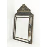 CUSHION MIRROR, 19th century Flemish repoussé brass frame with rectangular bevelled plate, flanked