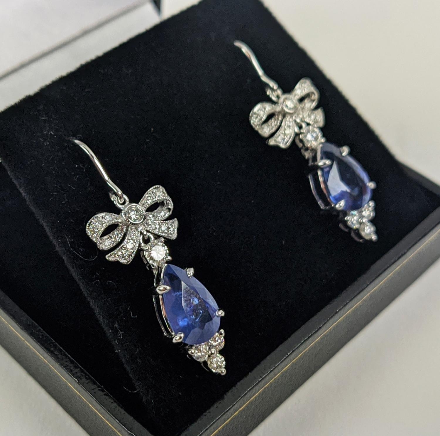 A PAIR OF 18CT WHITE GOLD SAPPHIRE AND DIAMOND PENDANT EARRINGS, central pear shaped faceted - Image 3 of 7
