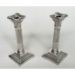 SILVER CANDLESTICKS, a pair, 20th century Corinthian capped fluted columns, (old inscription),
