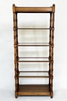 DISPLAY STAND, walnut with glass shelves and cane panelled undertier, 77cm W x 41cm D x 184cm H.