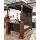 TESTER BED, 17th century oak, holly and fruitwood inlaid, carved panelled rectangular canopy above a