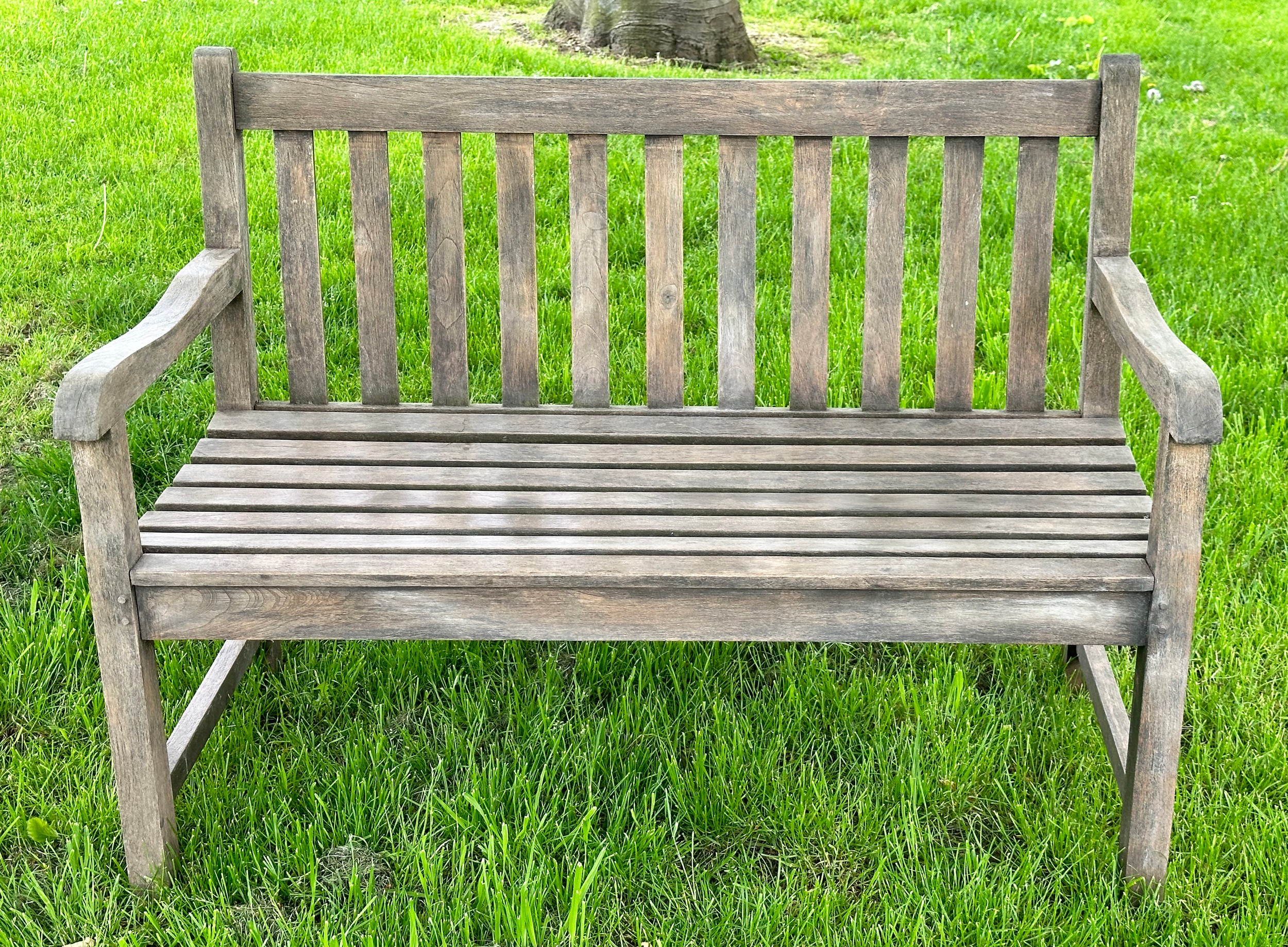 GARDEN BENCH, well weathered teak of slatted and pegged construction with shaped arms, 120cm W. - Image 2 of 6