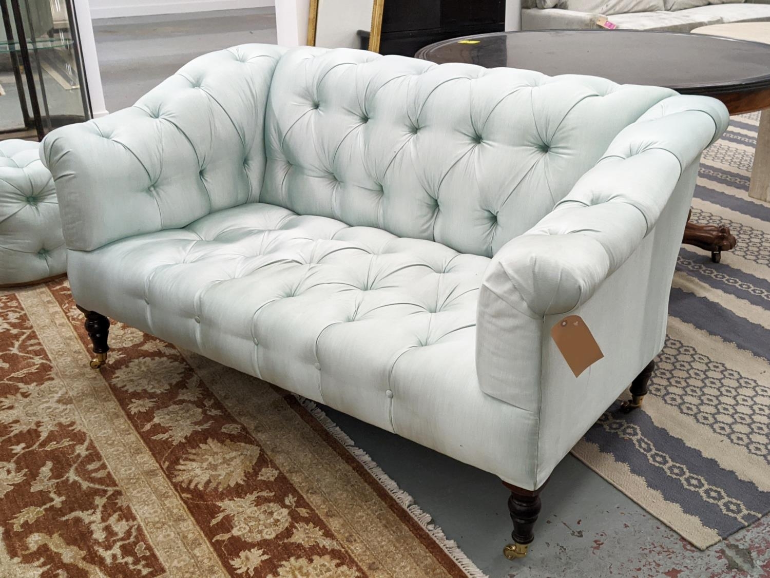 GEORGE SMITH SOFA, two seater, deep buttoned with light turquoise upholstery, 166cm W x 90cm H x