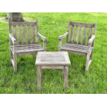 GARDEN ARMCHAIRS, a pair, weathered teak of slatted construction and shaped arms, 89cm H x 60cm W,