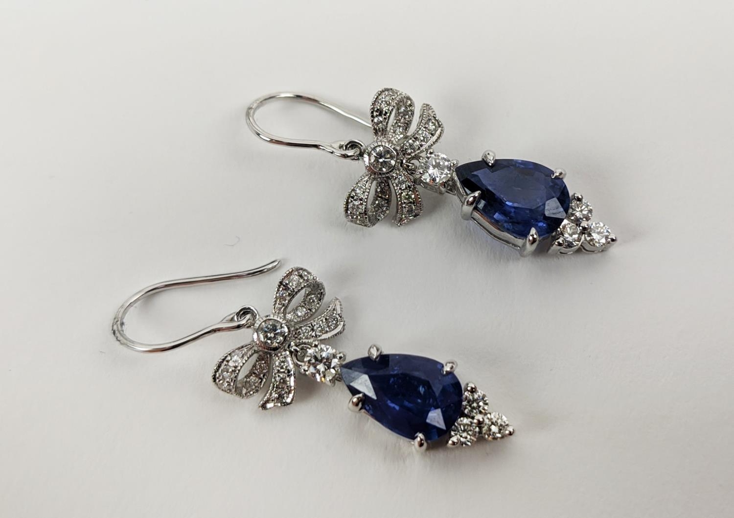 A PAIR OF 18CT WHITE GOLD SAPPHIRE AND DIAMOND PENDANT EARRINGS, central pear shaped faceted - Image 7 of 7