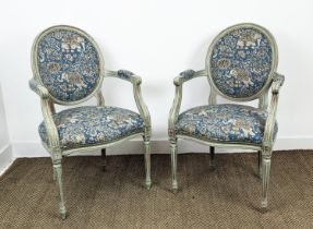 FAUTEUILS, a pair, Louis XVI style grey painted, in blue elephant patterned upholstery, 97cm H x