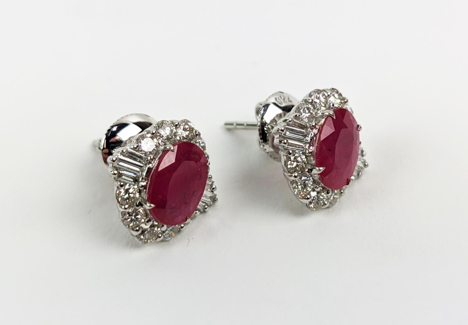 A PAIR OF 18CT WHITE GOLD RUBY AND DIAMOND STUD EARRINGS, the central mixed cut stones of - Image 5 of 7
