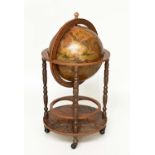GLOBE COCKTAIL CABINET, in the form of an antique terrestrial globe on stand with rising lid, 90cm