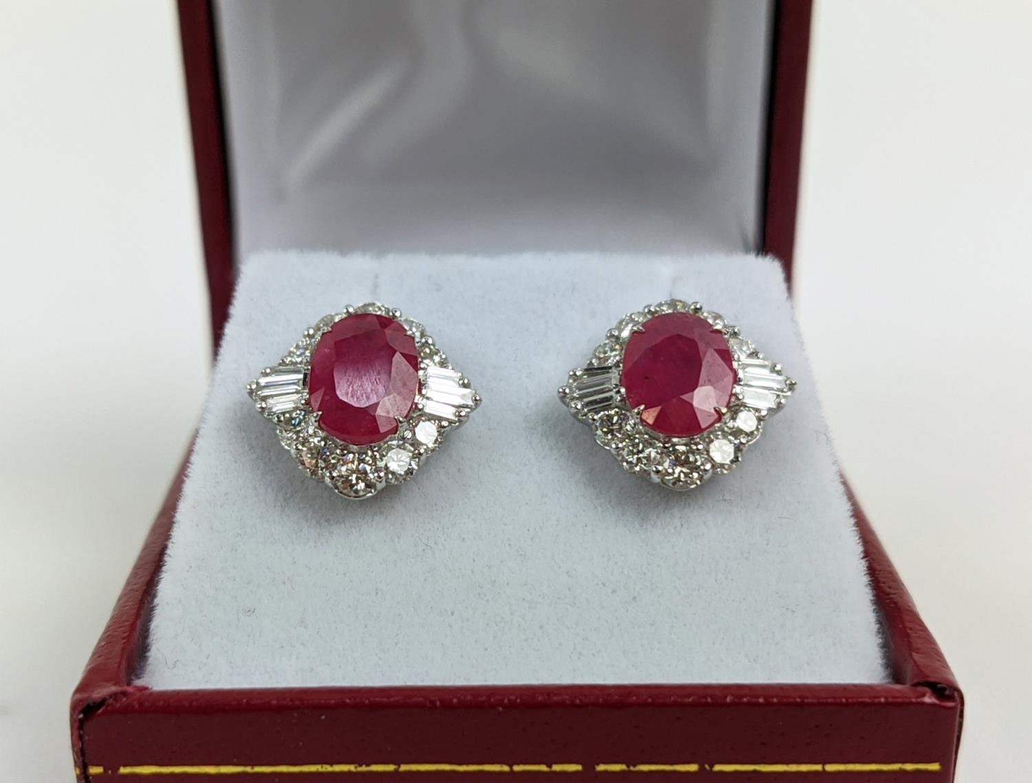 A PAIR OF 18CT WHITE GOLD RUBY AND DIAMOND STUD EARRINGS, the central mixed cut stones of - Image 2 of 7
