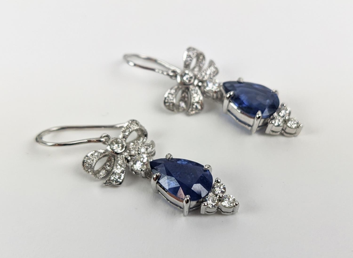A PAIR OF 18CT WHITE GOLD SAPPHIRE AND DIAMOND PENDANT EARRINGS, central pear shaped faceted - Image 5 of 7