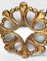HARRISON AND GIL WALL MIRROR, large giltwood with interlocking trefoil frame, 130cm H.