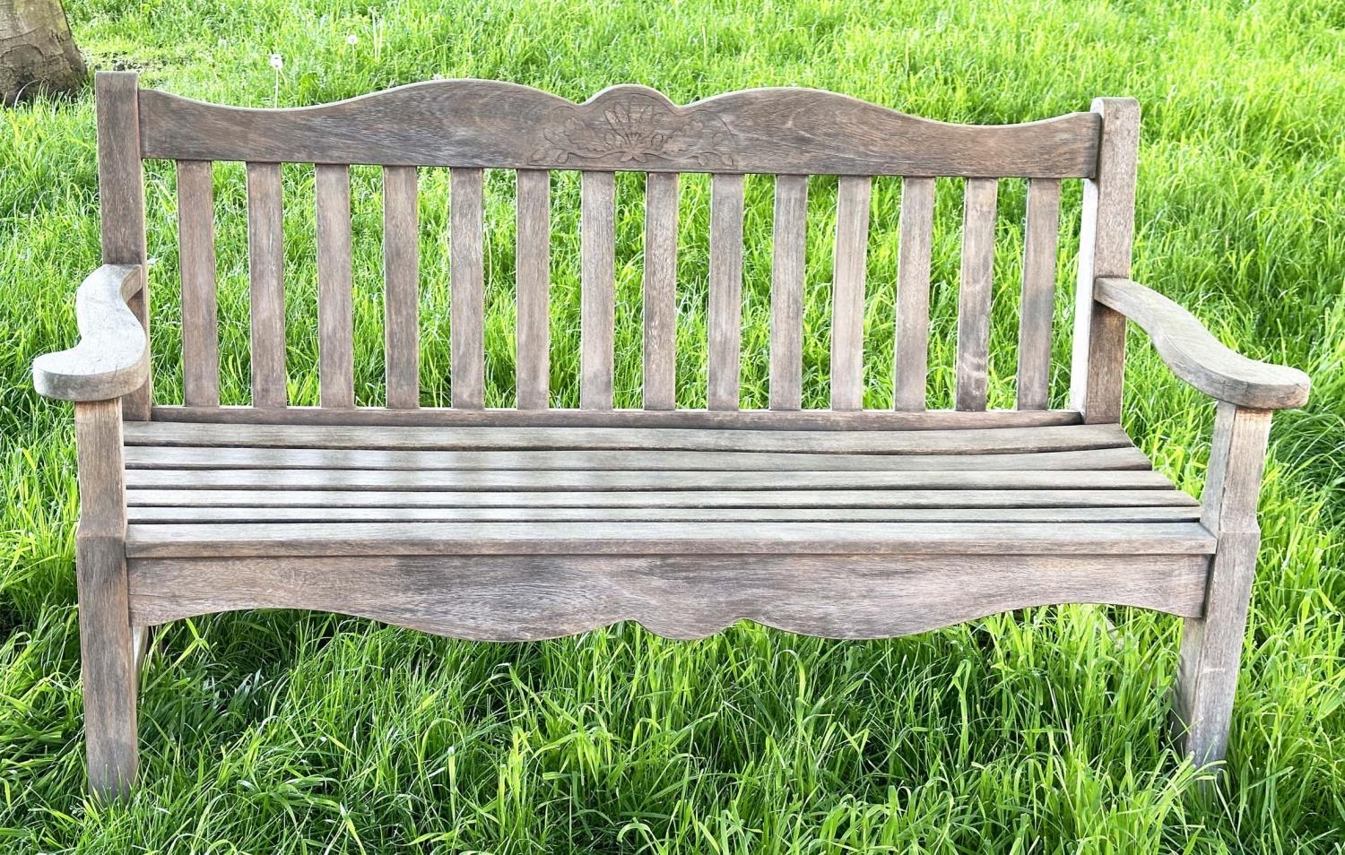 GARDEN BENCH BY 'BRIDGMAN AND CO', well weathered teak slatted with shaped yoke and shaped flat - Image 4 of 18