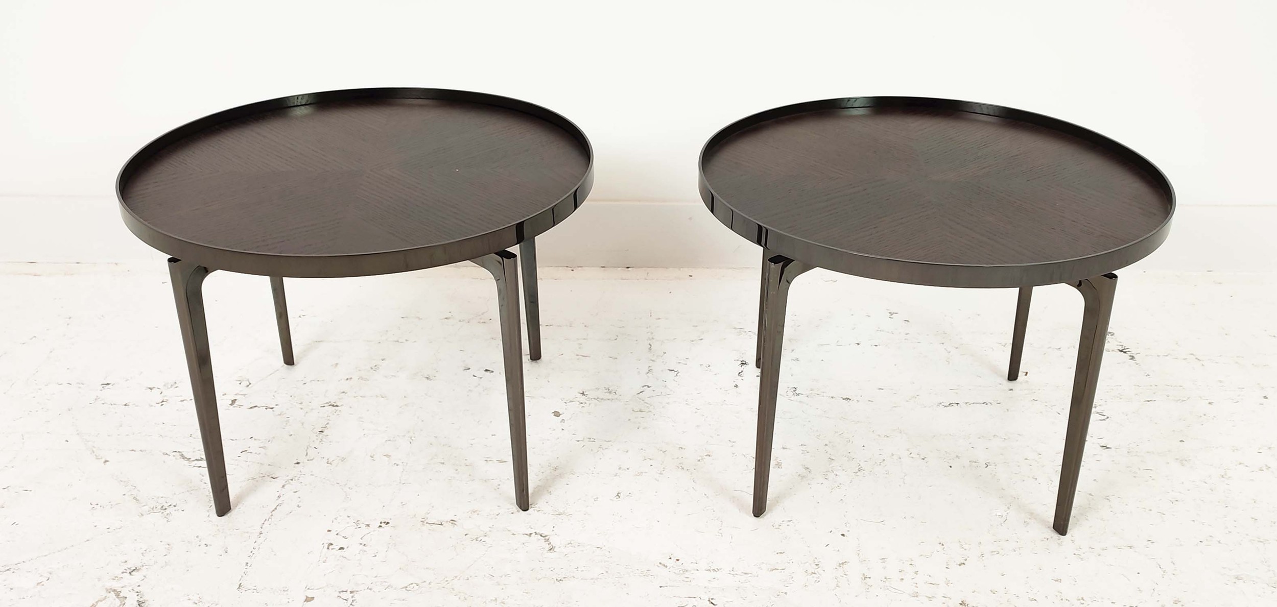 SIDE TABLES, a pair, 1970s Italian style, circular tops, 54.5cm x 39cm. (2)