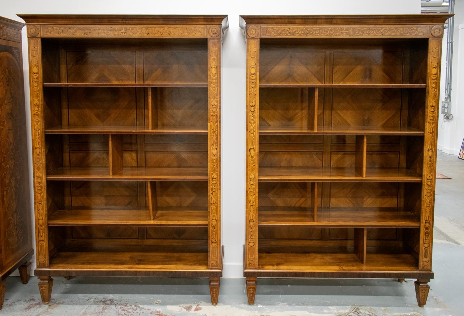 OPEN BOOKCASES, a pair, Italian walnut and marquetry with removable shelves and dividers, 212cm H