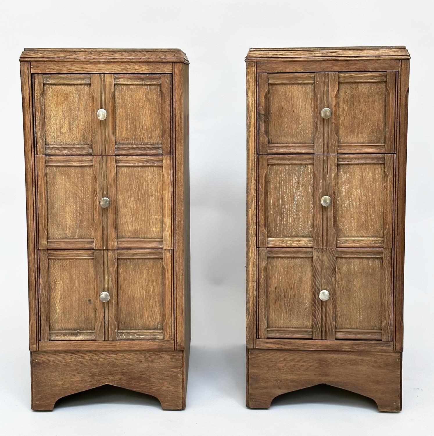 ART DECO BEDSIDE CHESTS, a pair, Heals style limed oak, each with three drawers, 78cm H x 50cm D x
