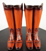 STICK STANDS, a pair, vintage leather boots design painted resin, 48cm H. (2)