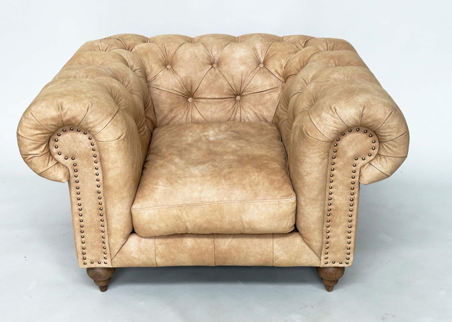 CHESTERFIELD ARMCHAIR, deep buttoned nubuck light tan leather with turned supports, 116cm x 73cm H.