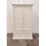 WARDROBE, in a white finish with two doors, hanging rail and three drawers 125cm W x 57cm D x