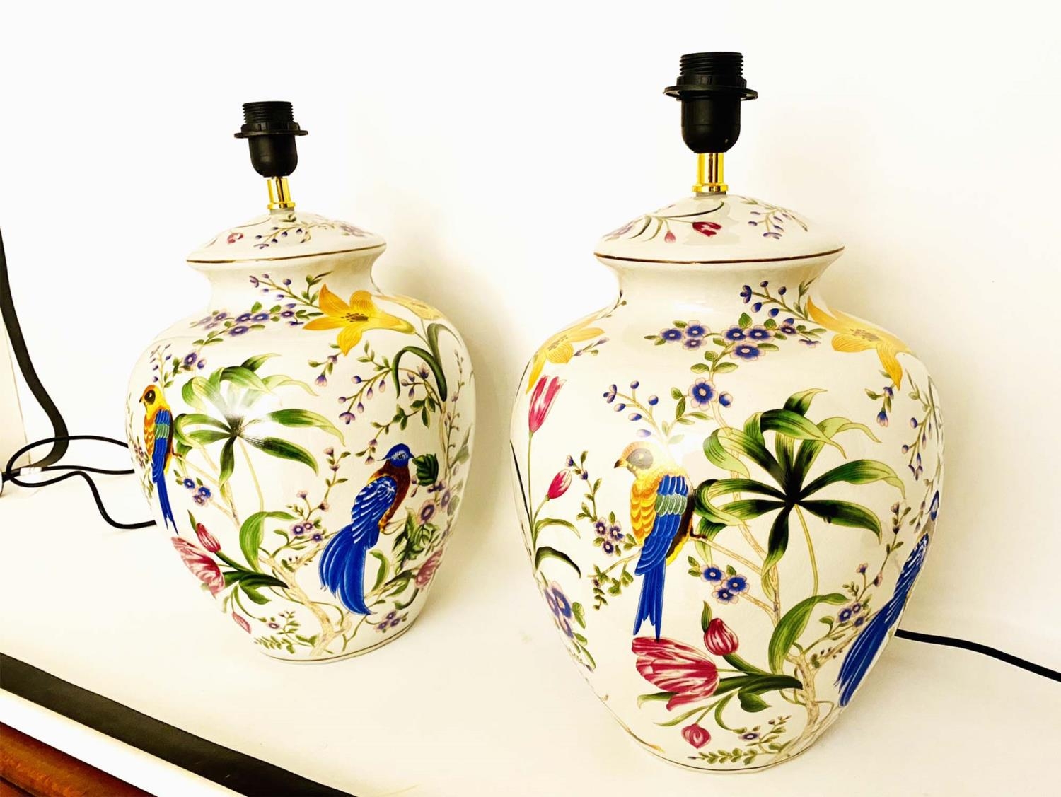 TABLE LAMPS, a pair, glazed ceramic with decoration depicting exotic birds amongst floral foliage,