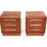 G PLAN SIDE CHESTS, a pair, vintage 1970s teak, each with three drawers, reverse labels dated