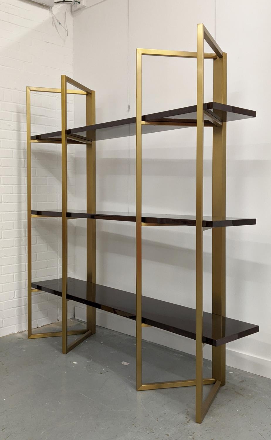 BOOKCASE, two gilt metal supports holding three veneered shelves, 200cm x 50cm x 208.5cm approx. - Image 2 of 6