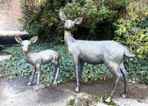 SCULPTURAL DOE AND FAWN, resin in faux bronze finish, 89cm x 80cm x 35cm doe, 62cm x 53cm x 25cm