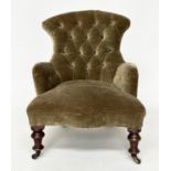 ARMCHAIR, Victorian green velvet upholstered with buttoned back, serpentine front and turned