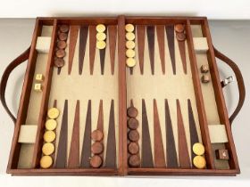 BACKGAMMON SET, in leathered case, complete with counters, 7cm x 23cm x 40cm.