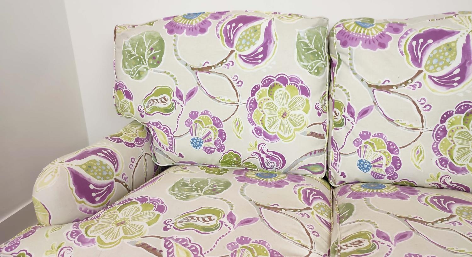 SOFA, purple and green floral patterned on brass castors, 90cm H x 160cm W. - Image 11 of 14