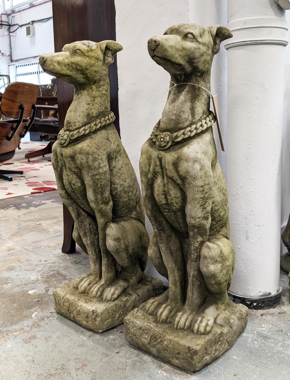 COMPOSITE STONE DOGS, a pair, 79cm H. (2)