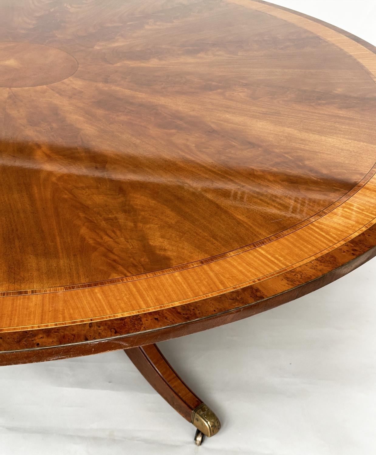 DINING TABLE, circular Regency style radially veneered mahogany and satinwood crossbanded with - Image 3 of 17