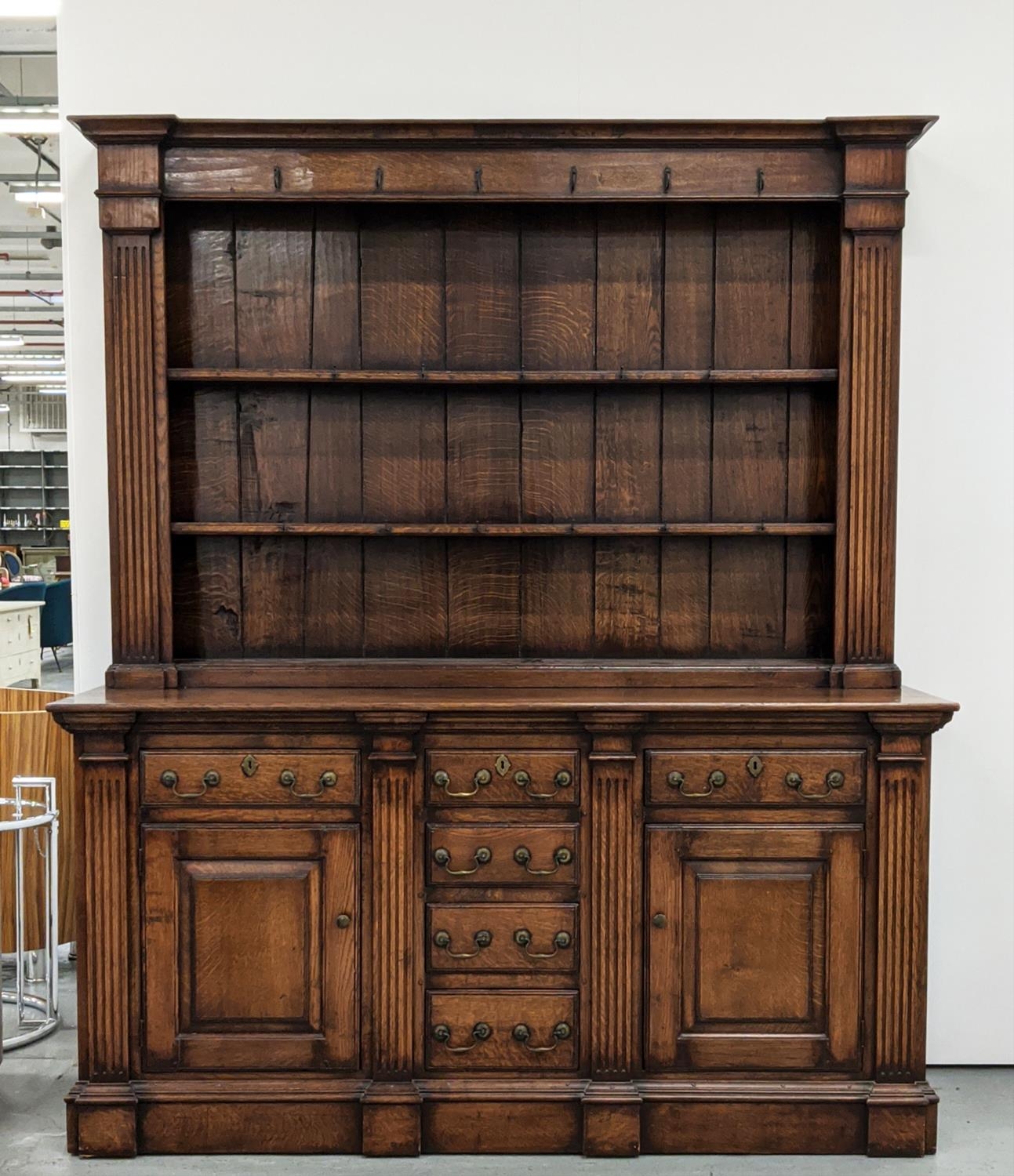 DRESSER, Georgian design oak the plate rack over six drawers and two cupboard doors with square