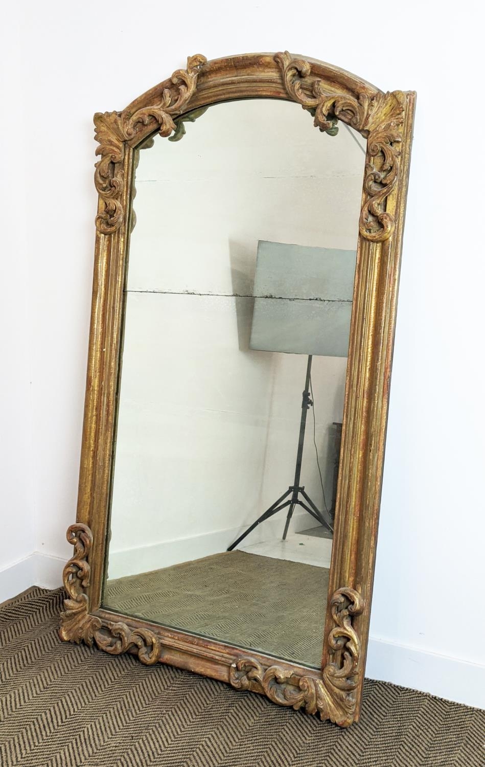 WALL MIRROR, early 19th century Continental giltwood and gesso with arched foliate scrolling frame - Image 2 of 12