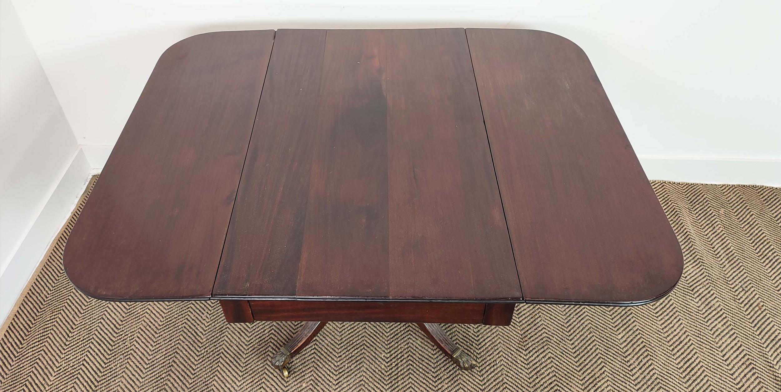 PEDESTAL PEMBROKE TABLE, Regency mahogany with a pair of drop leaves and drawer on reeded quadraform - Image 17 of 18