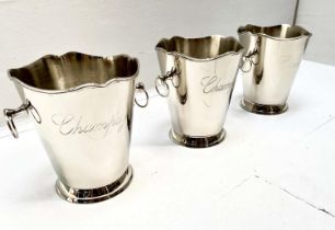 CHAMPAGNE BUCKETS, a set of three, polished metal, 23cm H x 22cm x 19cm. (3)