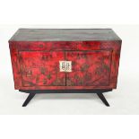 CHINESE CABINET ON STAND, 19th century scarlet lacquered and gilt polychrome decorated with two