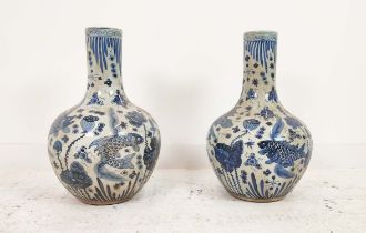 BOTTLE VASES, a pair, Chinese style blue and white ceramic, 60cm H x 38cm W. (2)