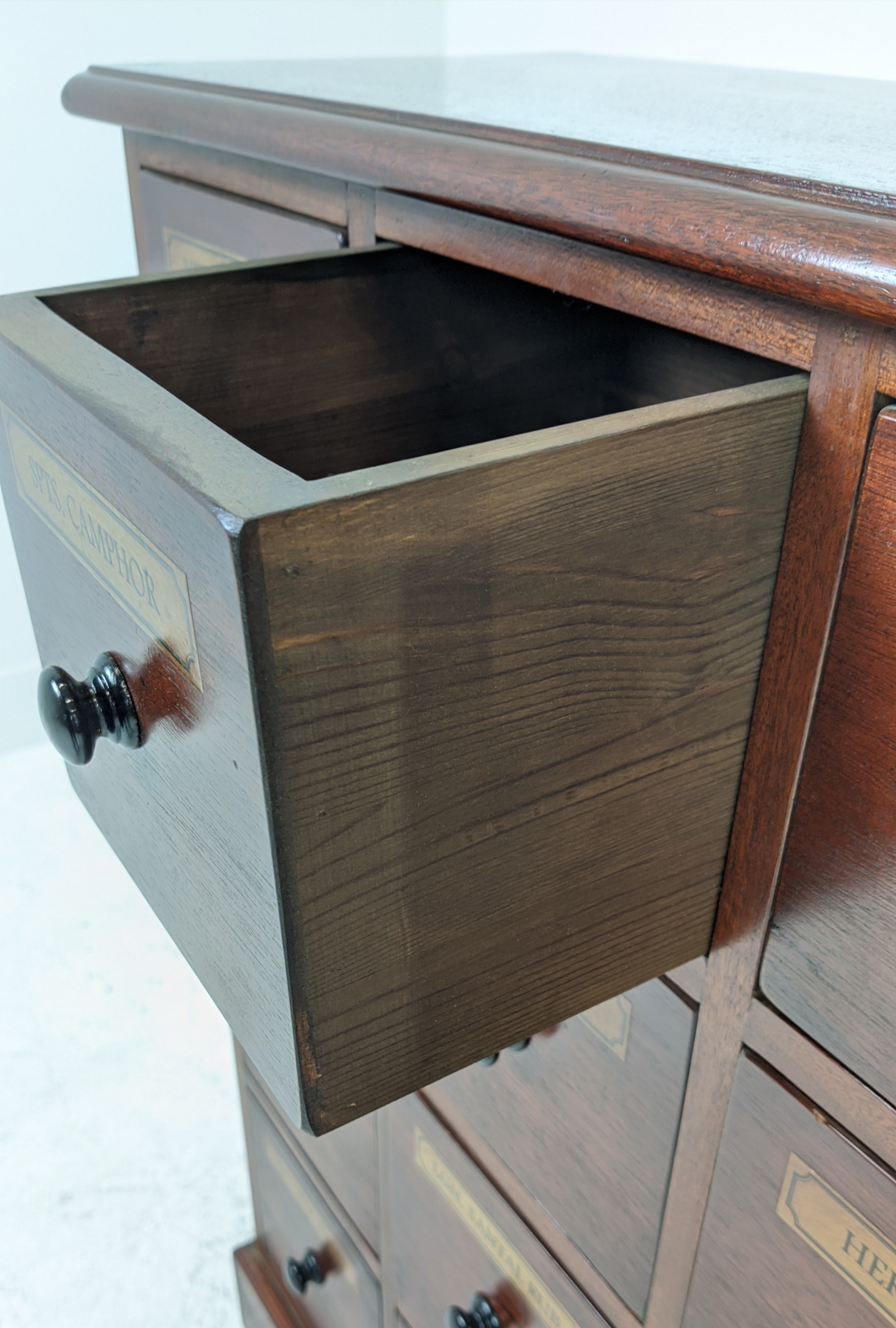 BANK OF DRAWERS, with sixteen drawers and vintage apothecary style labels, 89cm H x 104cm W x 27cm - Image 6 of 7