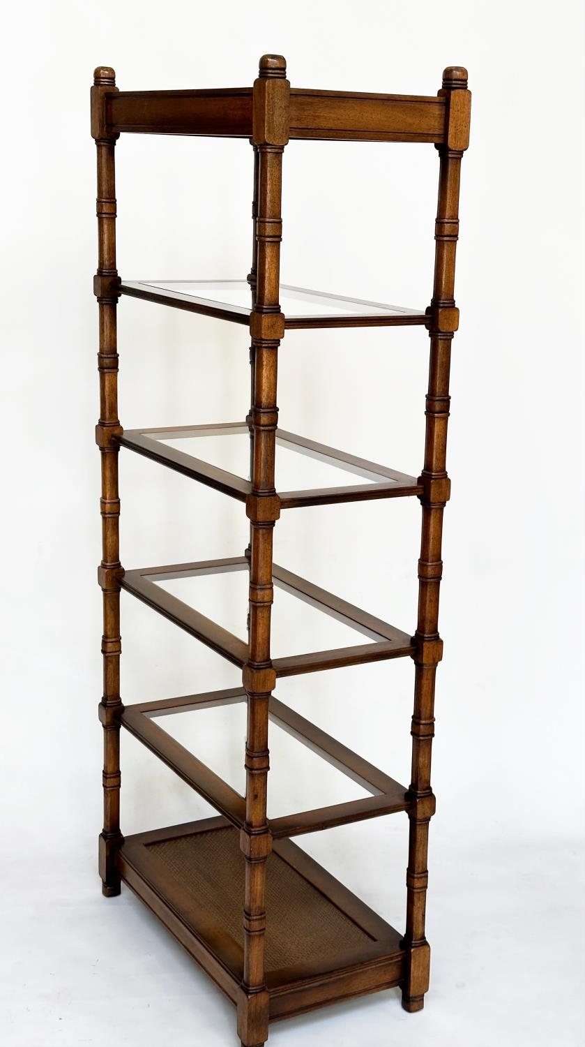 DISPLAY STAND, walnut with glass shelves and cane panelled undertier, 77cm W x 41cm D x 184cm H.