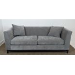 SOFA, dark grey upholstered, ebonised supports, 200cm x 85cm x 90cm.